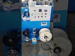 Double-head take-up machine with tension traction and automatic wire arrangement.